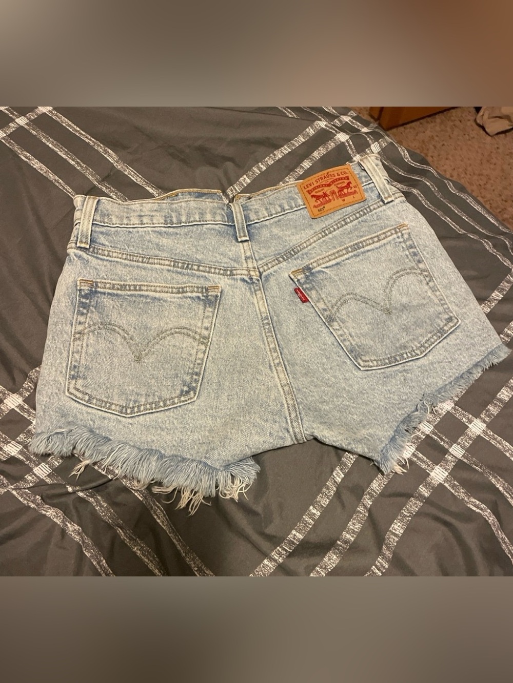 Levi's Light Blue Denim Frayed Hem Women's Cutoff Shorts